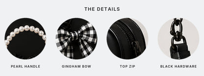 Close ups of the pearl handle, gingham bow, top zip and black metal hardware