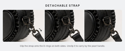 Detachable strap clipping onto the D-rings of the heart bag
